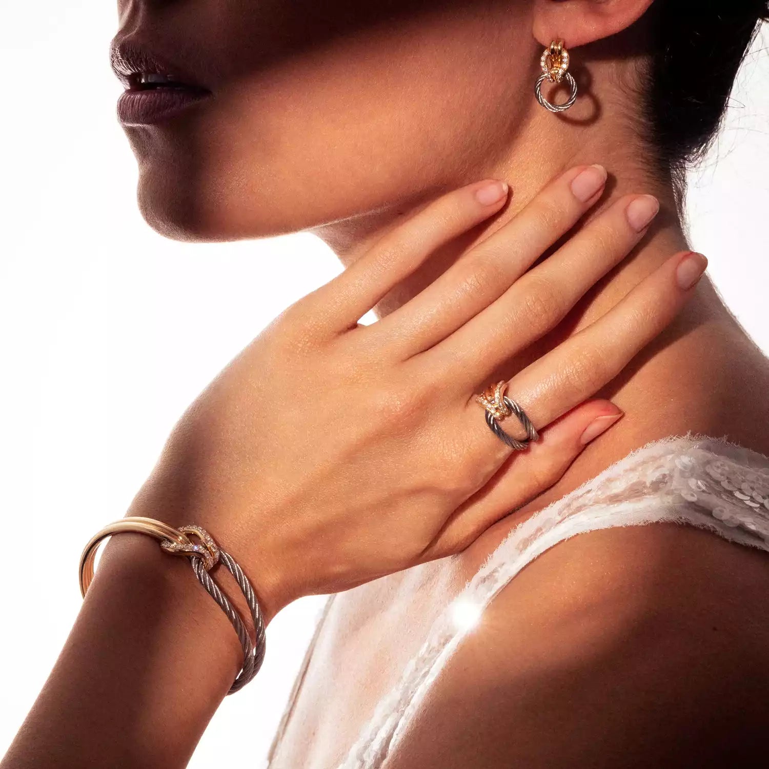 Stahl_Gold 18KT mit 22 Diamanten 0.33ct