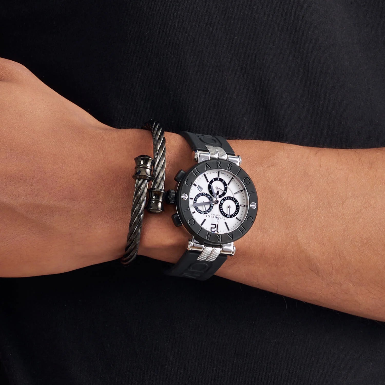 NAVIGATOR CRUISE, 41MM, QUARTZ CHRONOGRAPH CALIBRE, WHITE DIAL WITH 1 ARABIC AND 11 RHODIUM INDEX DIAL, STEEL BLACK PVD "CHARRIOL CHARRIOL" BEZEL, BLACK RUBBER INTERCHANGEABLE BRACELET - ©2025 Philippe Charriol International Ltd. -  Watch